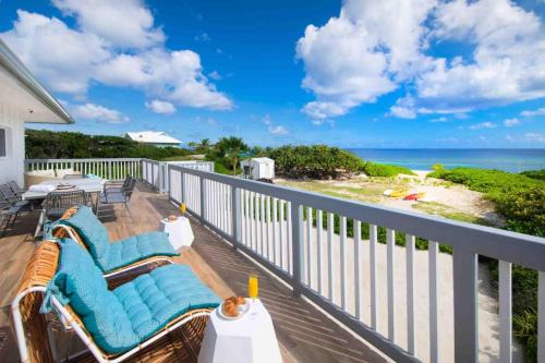 North Side House | Timmys Place - Charming Oceanfront Villa with Direct Beach Access and Scenic Views