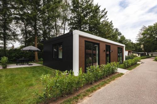 Voorthuizen Ski Chalet | Tiny House 'De Dennenhut'