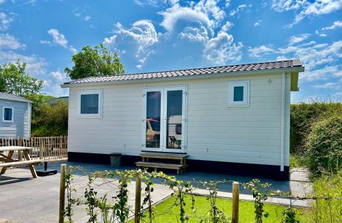 IJmuiden Ski Chalet | Tiny House in de duinen van IJmuiden aan Zee