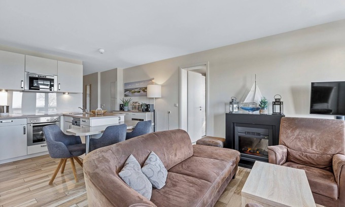 Wremen Apartment | Tolle Ferienwohnung in Strandnähe mit Sauna, Strandkorb u. Balkon mit Meerblick