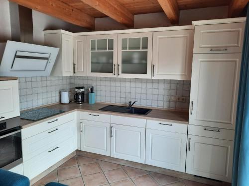 Krummhoern House | Tolles Ferienhaus in Pilsum - Ferienhaus Trientje - mit Garten und überdachter Terrasse
