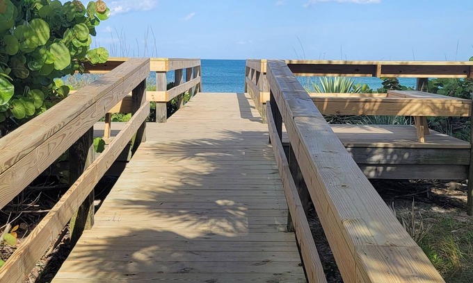 Satellite Beach Condo | TOP END UNIT, OCEANFRONT, 2024 RENOVATED, BARN DOOR Master shower, GORGEOUS