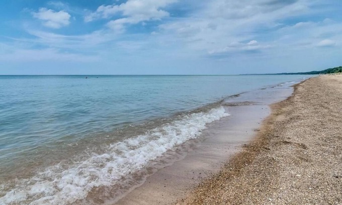 New Buffalo Condo | Top-floor downtown condo with pool, gym, walk to beach and more | A Skyline View