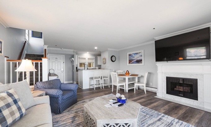 Boyne City Condo | Top-Floor Lake Charlevoix Condo | Private Beach Access | Gas-Log Fireplace