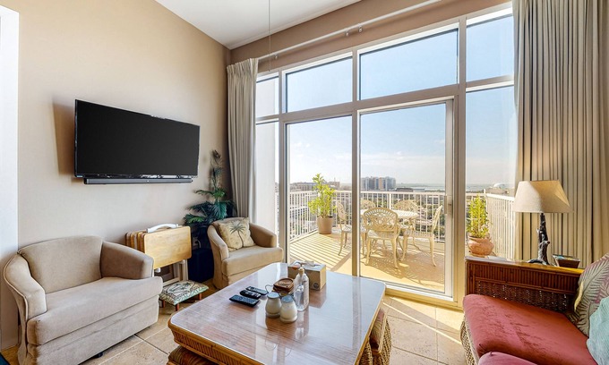 Galveston Condo | Top-floor non-penthouse condo with great ocean views, hot tub, heated pool