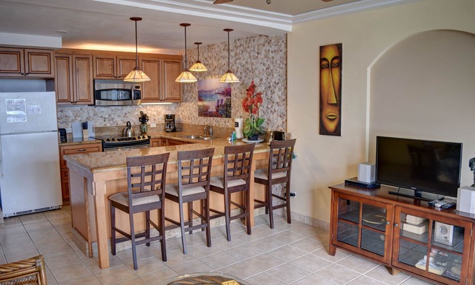 Kihei Condo | Top floor, oceanfront, steps to beach!