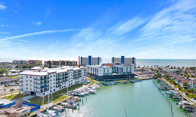 Madeira Beach Condo | Top Floor Waterfront Condo. Outstanding Views. Heated Pool. Exceptional Accommodations. Near Beach.