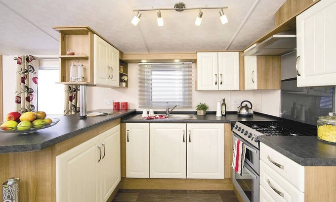 Burnham-on-Sea House | Top of the range 12ft-wide caravan with one double and two twin.