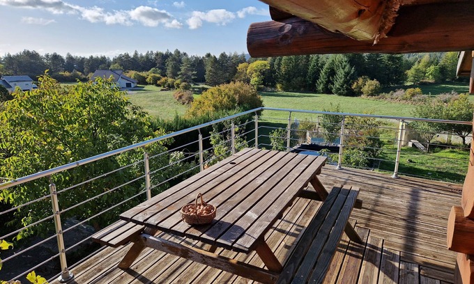 Camprieu Ski Chalet | Traditional log cabin with Jacuzzi and wooded garden in the Cévennes