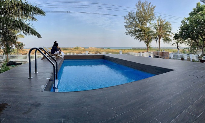 Laem Phak Bia House | Traditional Northern Thai beach house with a swimming pool
