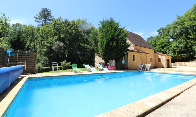 Beynac-et-Cazenac House | Traditional stone cottage wih enclosed garden and private heated pool at Beynac
