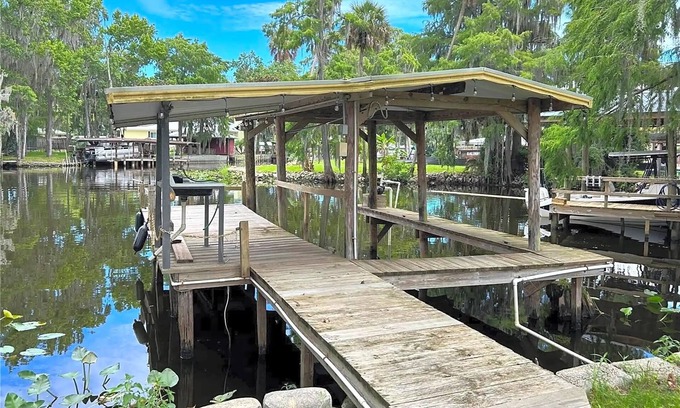 Astor House | Tranquil 3-bedroom house in Astor with direct St. Johns River access.