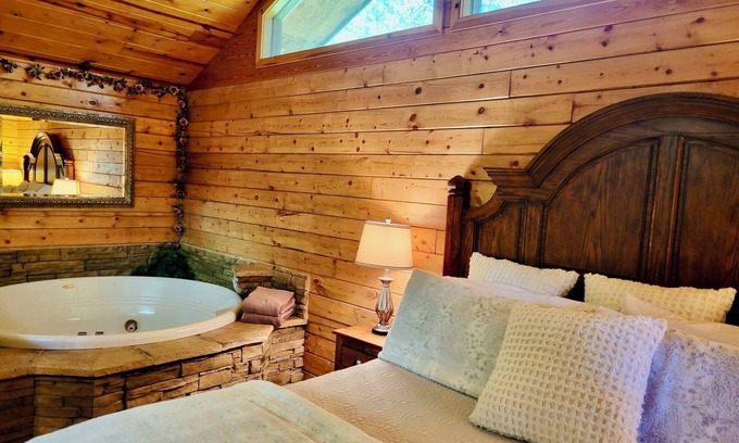 Eureka Springs Cabin | Tranquil Cabin- Perched on Mountain Top boasting jacuzzi for two and expansive deck with views! Trail & Cave on Property!
