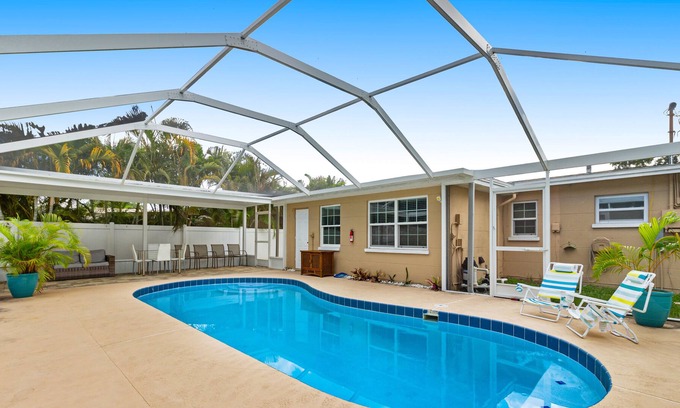 Walsingham House | Tranquil escape with screened pool, fenced yard, lanai, & Pinellas Trail access