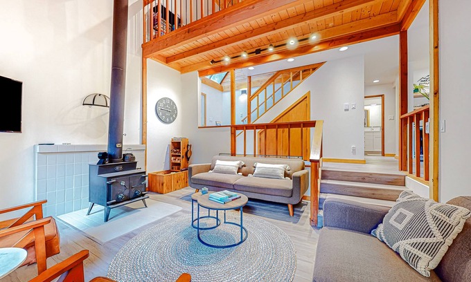 Warnick House | Tranquil forested oasis near rivers and trails with firepit, games, & wood stove