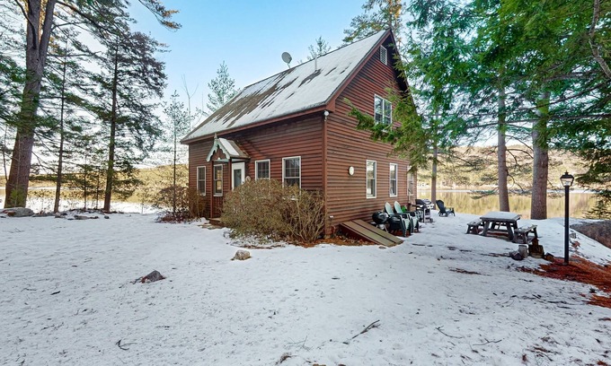 South Casco House | Tranquil Lakefront Retreat with large outdoor patio, beach and Stunning Views