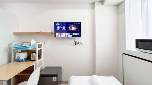 Makassar Apartment | Tranquil Studio (No Kitchen) Apartment Bandaraya - Tallasa City Makassar By Travelio
