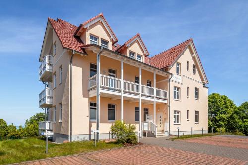Gohren Apartment | traumhafter Meerblick vom Balkon, gratis Nutzung vom AHOI Erlebnisbad und Sauna in Sellin - Villa Bergfrieden