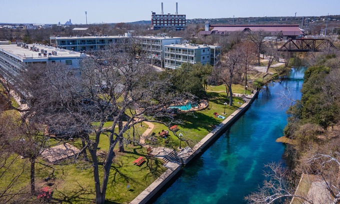 New Braunfels Condo | Treasure on the COMAL! Downtown with Pool/Hot Tub!