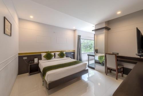 Stage 1 Hotel | Treebo Raj Premier, Indiranagar
