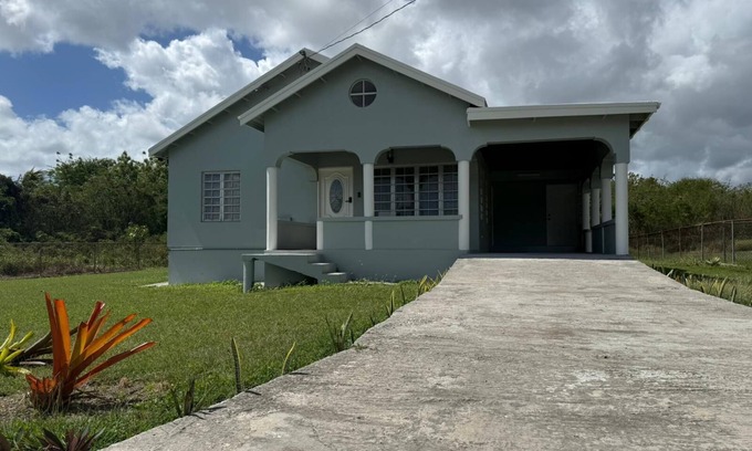 Fitches Creek House | Tropical Bliss Retreat – 3BR Oasis near Beach, St. John’s & Airport
