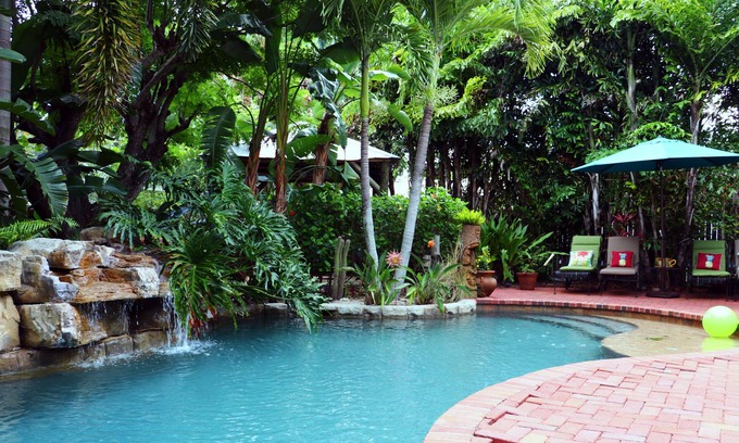 Bradenton House | Tropical bungalow oasis; heated pool with rock waterfall and hot tub. Sleeps 8!
