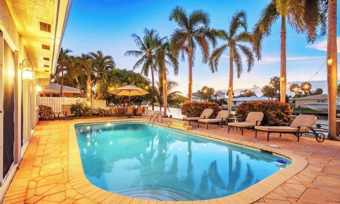 Cypress Lakes Villa | Tropical Dream: Waterfront pool home w/boat rental