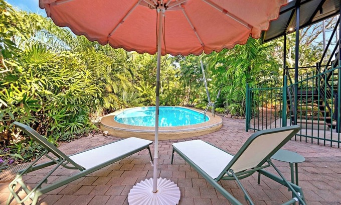 Rapid Creek House | Tropical Luxe Treehouse Lush Poolside Living
