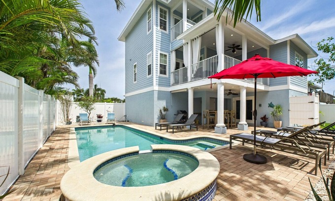Holmes Beach House | Tropical Oasis| Pool, Hot Tub, Game Room & 7 Minute Walk to the Beach!