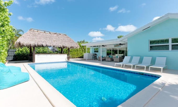 Hunt Club Villa | Tropical Villa Pool Home w/Tiki Bar! Sleeps 9!