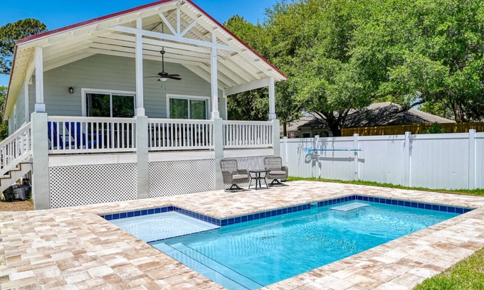 Butler Beach House | Tropical Winds - Heated Pool & Firepit! Walk to the Beach!