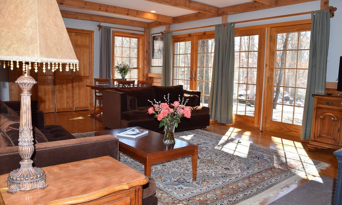 East Falmouth House | Tucked away in a private wooded setting