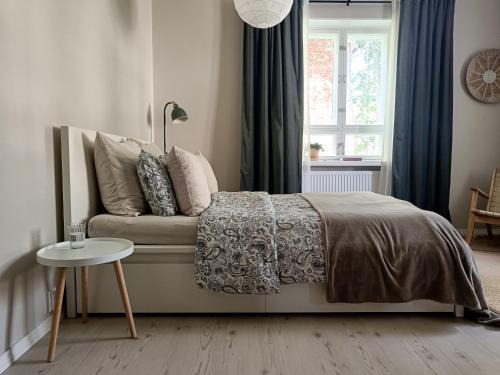 Lahti Apartment | Tunnelmallinen yksiö kaupungin läheisyydessä