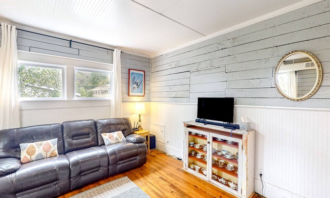 Bandon House | Turn-of-the-century home near beaches with porch, fenced yard & fireplace