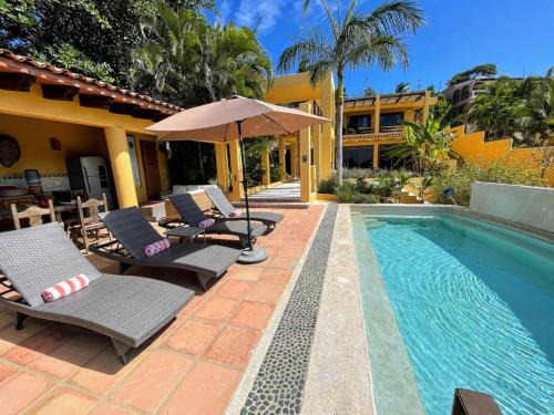 Litibu Villa | Twenty Steps from Litibu Beach at this Hideaway