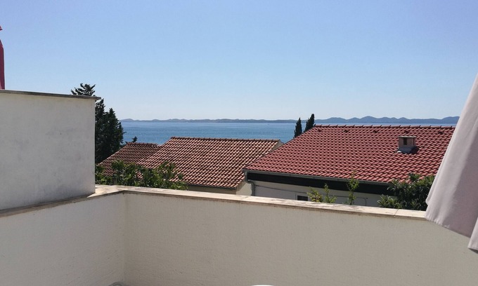 Zdrelac Apartment | Two bedroom apartment with terrace and sea view Ždrelac, Pašman (A-8046-b)