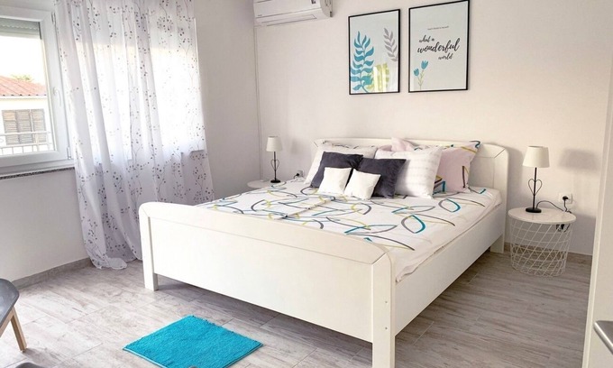 Krk Apartment | Two bedroom apartment with balcony and sea view Krk (A-22395-b)