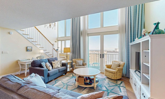 North Ocean City Condo | Two-story beachfront penthouse with ocean & bay views, pools & game room