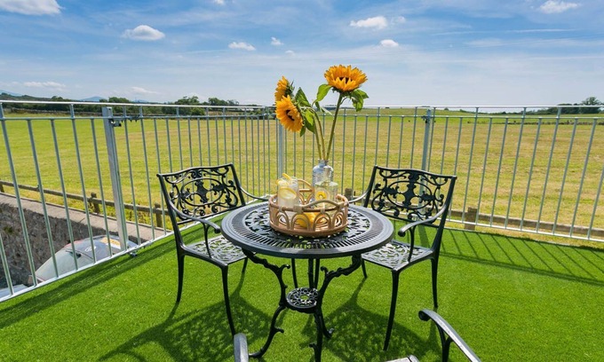Pentraeth Cottage | Ty Gwair - a cosy fire that sleeps 4 guests in 2 bedrooms