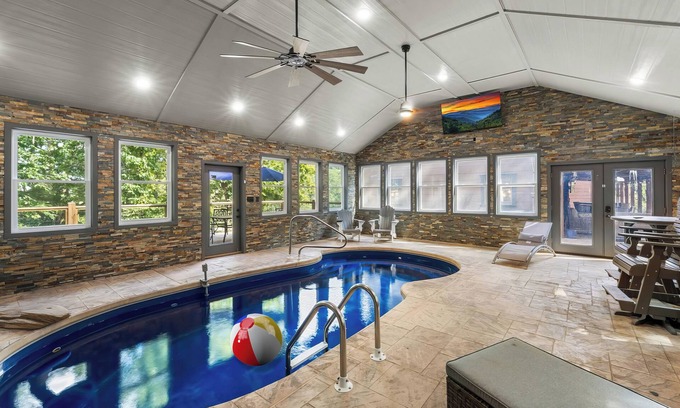 Pigeon Forge Cabin | Unforgettable Mountain Luxury, Indoor Pool, Theater, Arcade, Firepit, 30 Ppl