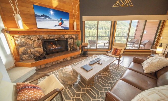 Lakeside Village Condo | Unit with wood burning fireplace and free shuttle