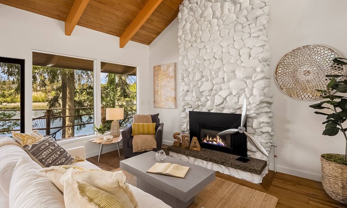 Rollingbay House | Updated beachfront home with private beach, water views, spacious deck, & W/D