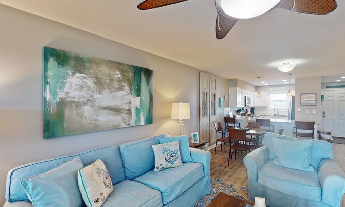 Orange Beach East Condo | Updated condo with Gulf & river views & pool - across from beach & near dining