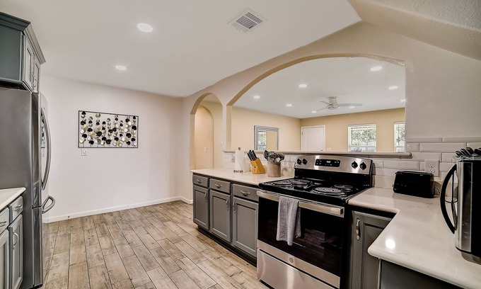 San Antonio House | Updated, dog-friendly home with fenced yard, grill, sunroom, & W/D