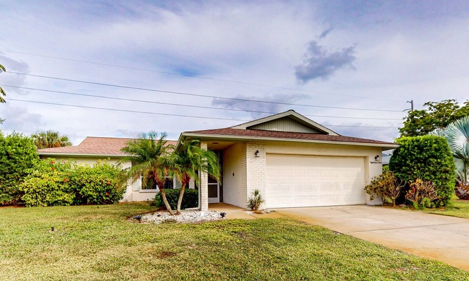 Bradenton House | Updated home with enclosed pool, open layout, grill, W/D, streaming, and AC