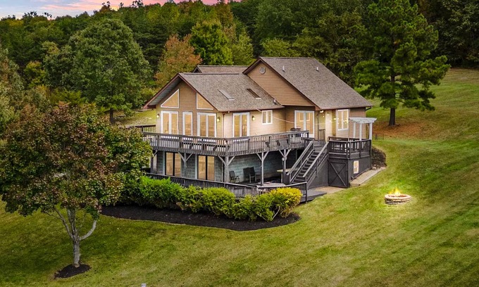 Livingston House | Updated lakefront home & studio with water views, beach, dock & game room