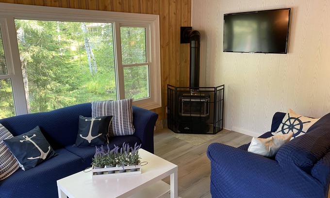 Round Lake Cottage | Updated Riverfront Cottage with Lake Access & StarLink, for Recreationalists!