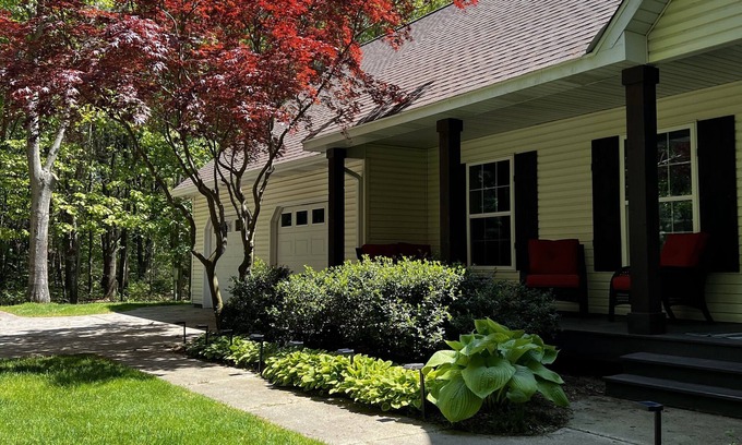 Fennville House | Upscale Picturesque Hideaway. Fenced Yard, Hot tub, Firepit and Game Room.