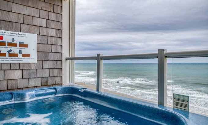 Lincoln City Condo | Upstairs Ocean-Front Condo has Hot Tub, 2 King Beds and Resort Amenities!