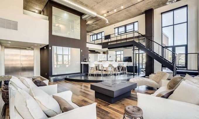 Brown and Stetson Business Condo | Urban chic loft, twinkling lights & mountain views